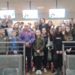 Foto di gruppo sotto ai tabelloni